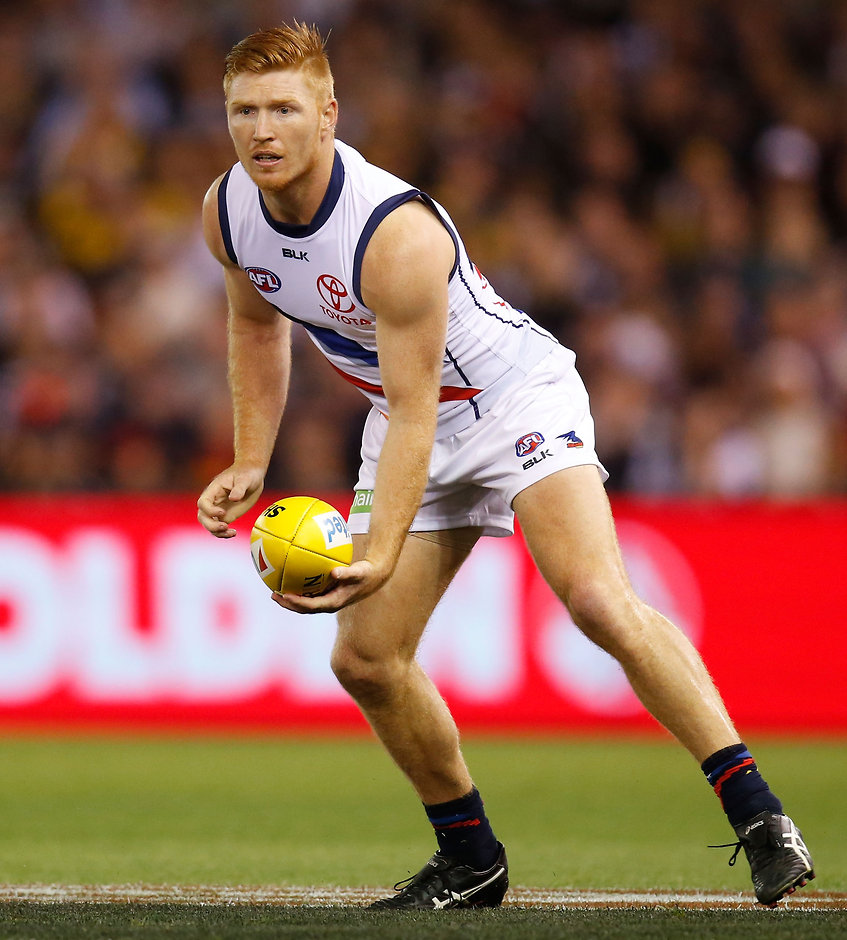 AFL 2015 Rd 02 - Collingwood v Adelaide Kyle Cheney of the Crows in action during the 2015 AFL Round 02 match between the Collingwood Magpies and the Adelaide Crows at Etihad Stadium, Melbourne on April 11, 2015. (Photo: Michael Willson/AFL Media)
